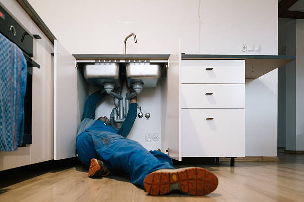 Professional Drain Cleaning technician working in London Mills, IL